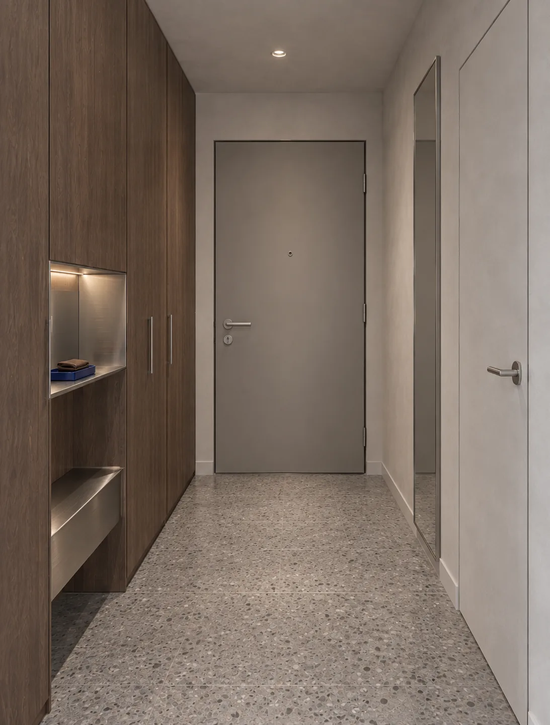 Randare 3D a holului de intrare: dulap din nuc, nișă din inox și pardoseală de terrazzo.